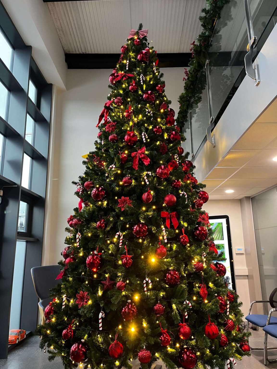 Decorated Christmas tree in a corporate office lobby installed by Christmas Creations Company, Dublin